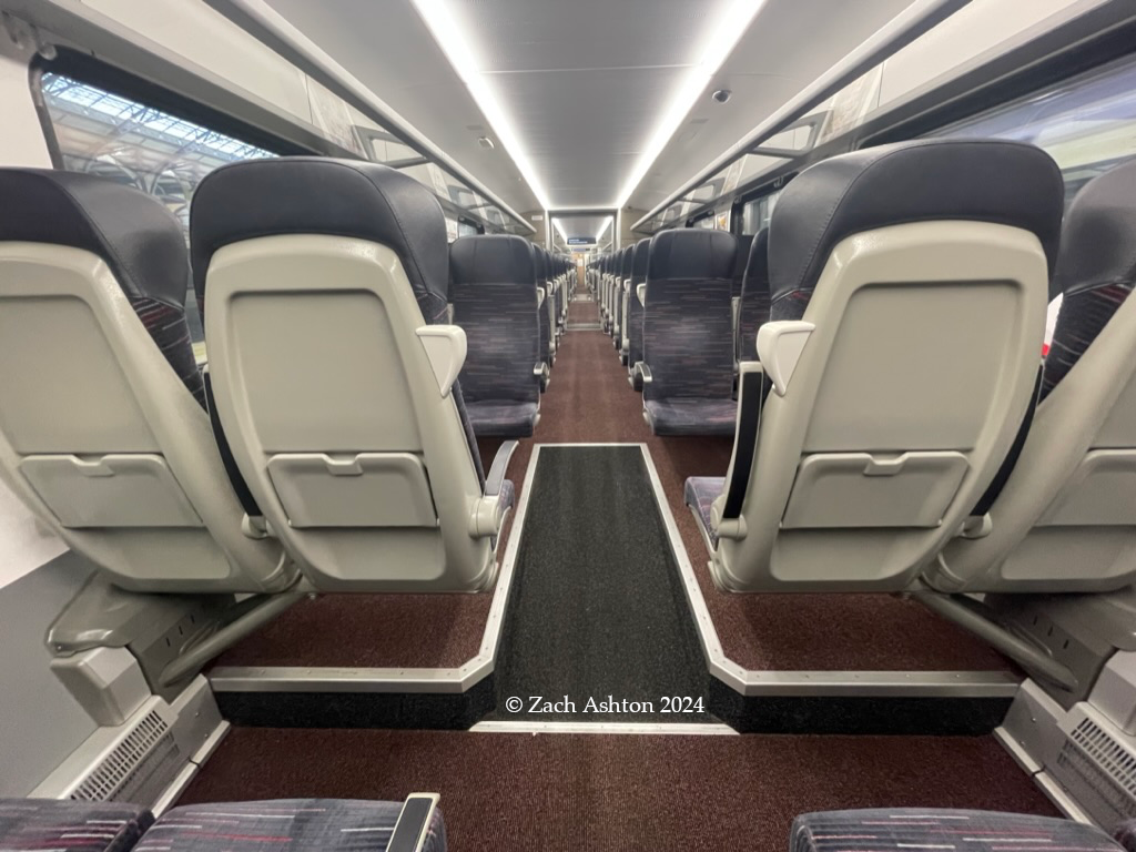 The interior of a Class 745 over the powered bogie.