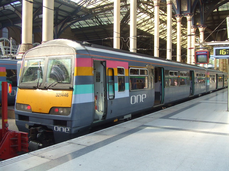 A BREL Class 321 stands at Liverpool Street Station.