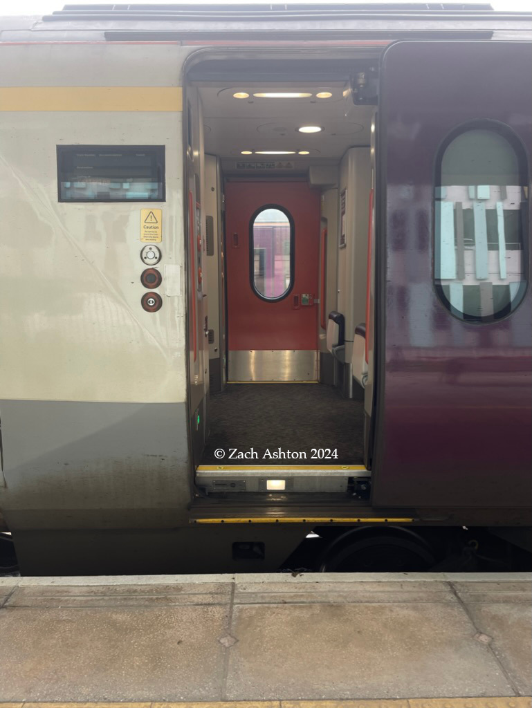 A photograph of an open Class 222 passenger door. A step is visible to help passengers board